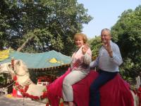 Pakistan transportation for Pastor Leo Strathman and Donna on a camel.