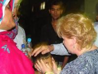 Donna praying for deaf and dumb boy who God healed - his first words he spoke was JESUS