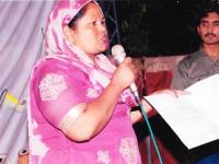 This woman had cancer, but after prayer at the healing Crusade,she is holding a Doctors report that she is cancer free.